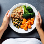 **Image of a person mindfully eating a meal, focusing on the textures and flavors of fresh, whole foods. The setting should be a calm and uncluttered environment, emphasizing the concept of conscious eating and a healthy relationship with food for diabetes management.** (Keywords: mindful eating, diabetes, healthy food, whole foods, calm environment, conscious diet)